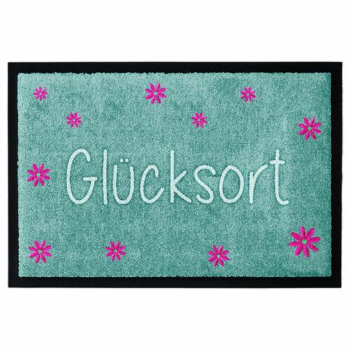 Waschbare Design-Fußmatte "Glücksort" von Glücksmatte in Türkis mit Blumen. Mit Rand.