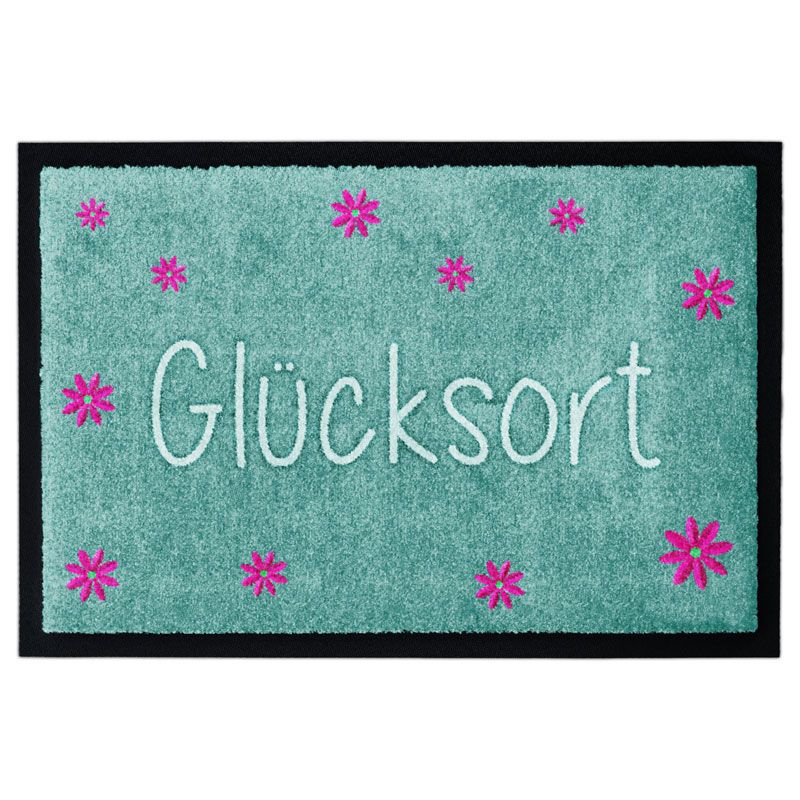 Waschbare Design-Fußmatte "Glücksort" von Glücksmatte in Türkis mit Blumen. Mit Rand.