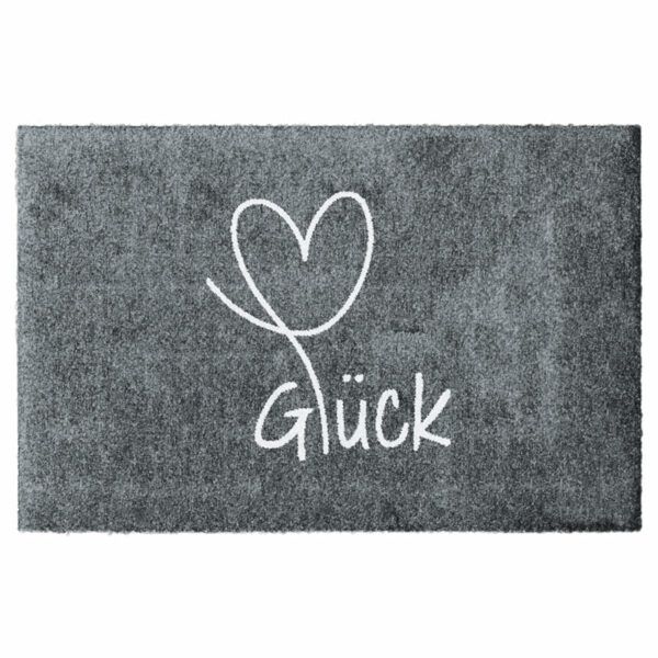 Waschbare Fußmatte von Glücksmatte.com mit einem Herz und der Aufschrift "Glück". Farbe Grau. Ohne Rand. Umweltfreundlich in Deutschland hergestellt.