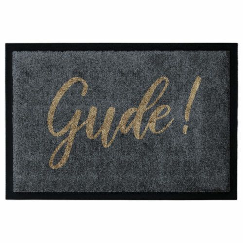 Waschbare Fußmatte von Glücksmatte.com mit Aufschrift "Gude!" in Goldbraun auf Anthrazit. Mit Rand. Umweltfreundlich in Deutschland hergestellt.