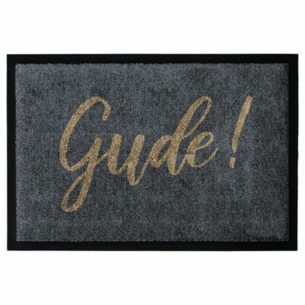 Waschbare Fußmatte von Glücksmatte.com mit Aufschrift "Gude!" in Goldbraun auf Anthrazit. Mit Rand. Umweltfreundlich in Deutschland hergestellt.