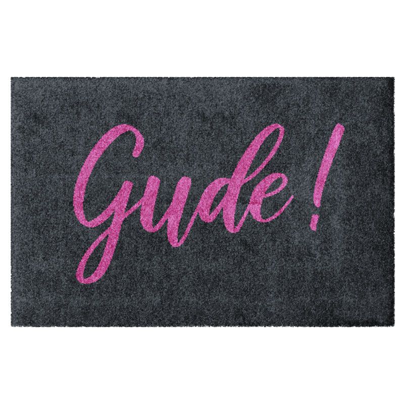 Waschbare Fußmatte von Glücksmatte.com mit Aufschrift "Gude!" in Rosa auf Anthrazit. Ohne Rand. Umweltfreundlich in Deutschland hergestellt.