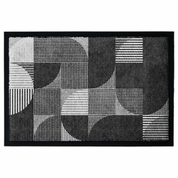 Waschbare Fußmatte von Glücksmatte.com mit einem geometrischen Muster in Schwarz-Weiß. Mit 2cm Gummirand. Umweltfreundlich in Deutschland hergestellt.