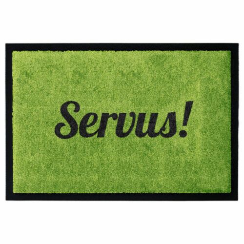 Waschbare Fußmatte von Glücksmatte mit dem Gruß "Servus!" in Schwarz auf Grün
