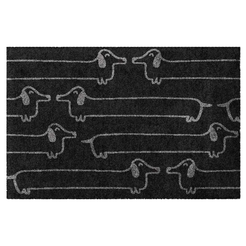 Das Bild zeigt eine Fußmatte mit stilisierten Dackel