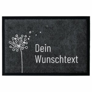 Personalisierbare Fußmatte mit einer Pusteblume auf Hintergrund in Grau mit Platzhaltertext "Dein Wunschtext"